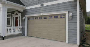 House with beige garage door.
